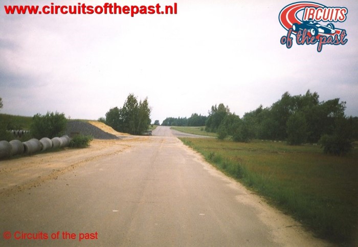 The main straight with on the left hand the chicane under lumps of sand at the abandoned Nivelles-Baulers circuit in 1998